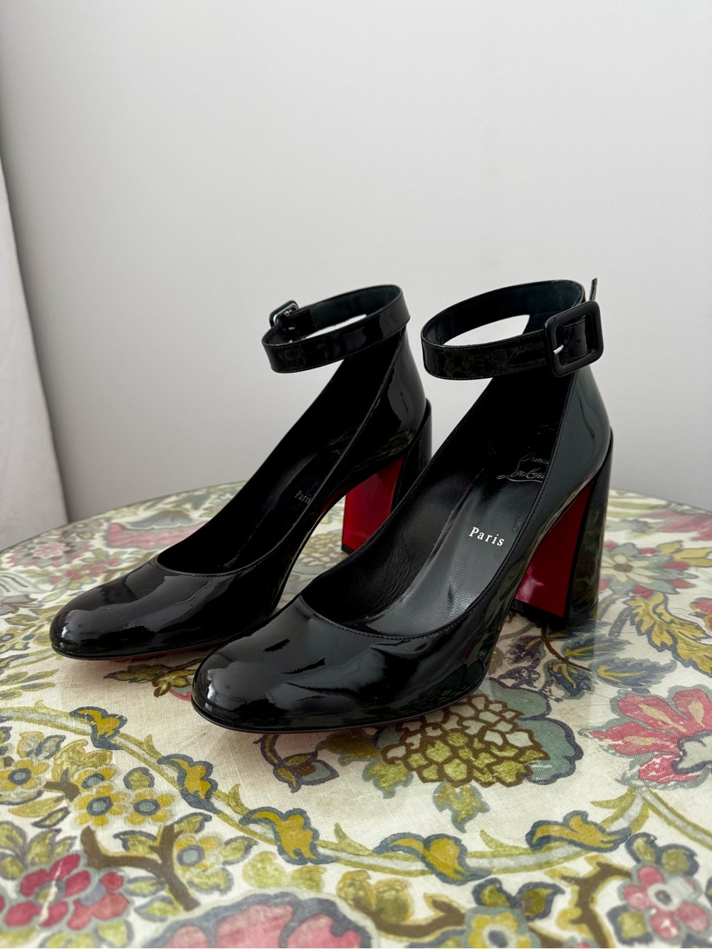 Christian Louboutin black patent leather pumps